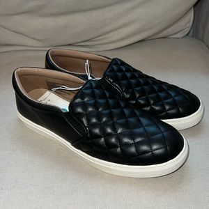 A new day black slip on shoes size 8. Never worn. Great condition